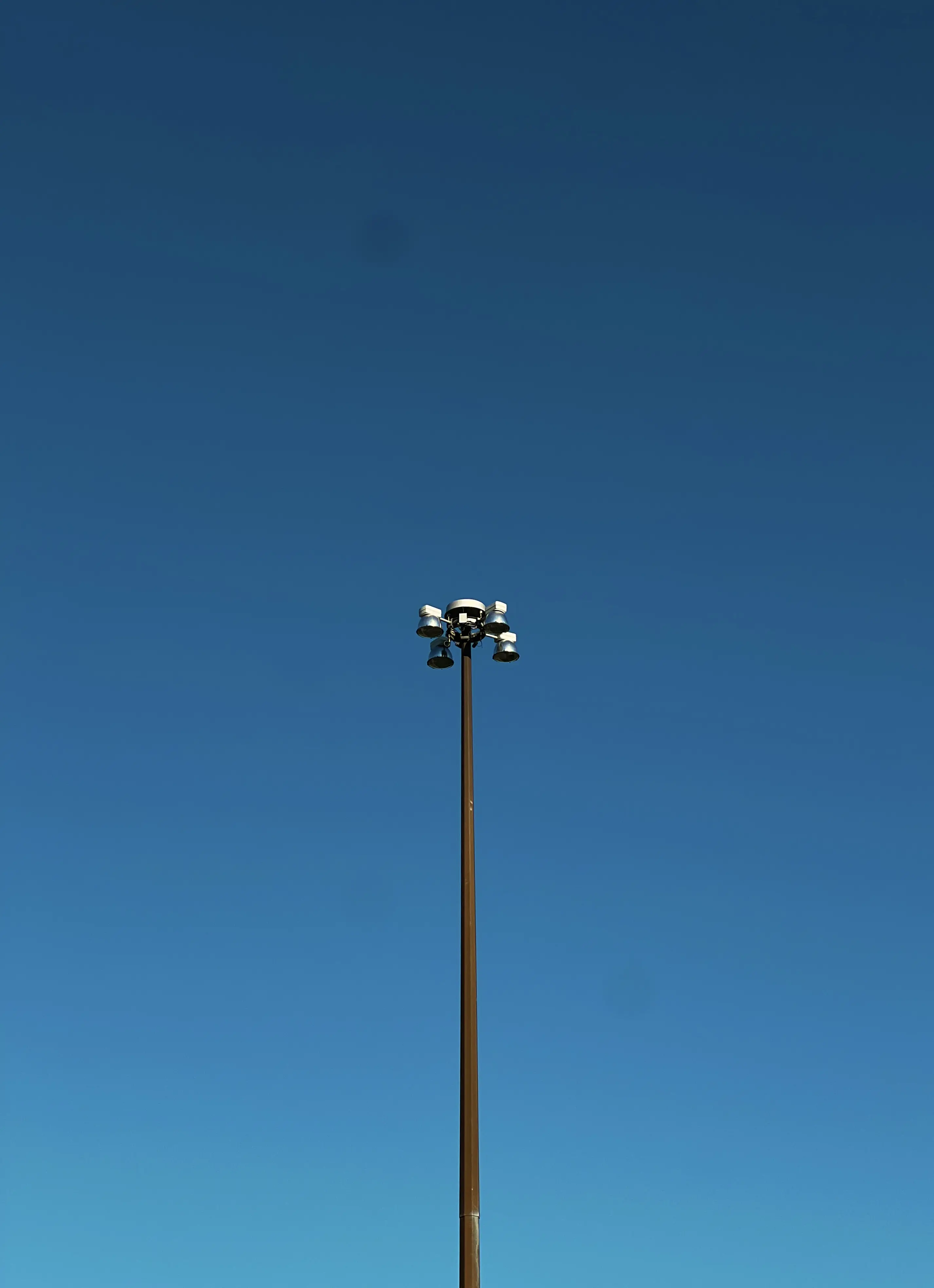 A lamp post in the middle of the sky.